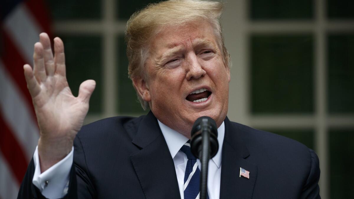 President Trump delivers a statement in the Rose Garden of the White House on May 22.