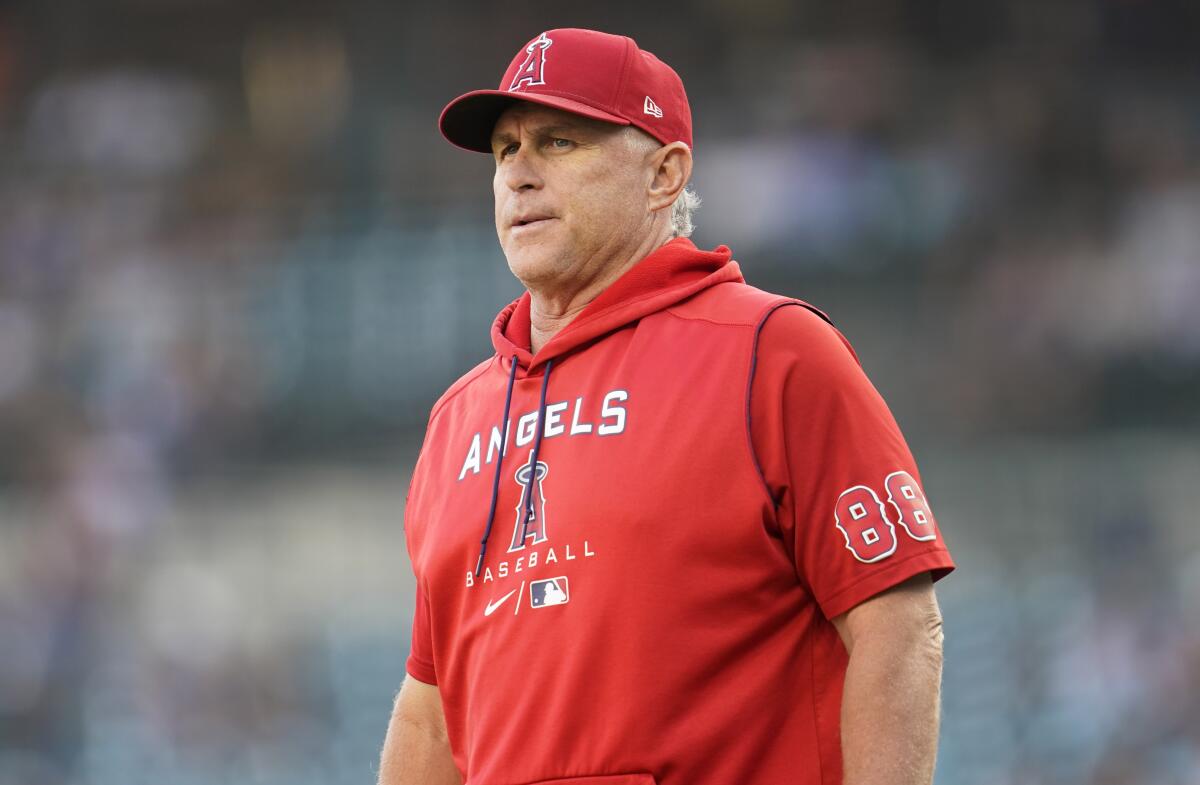 Angels interim manager Phil Nevin watches the team against the Detroit Tigers on Aug. 19, 2022.