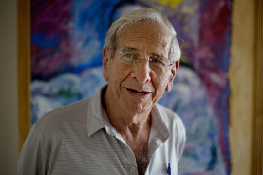 FILE - Israeli actor Chaim Topol speaks during an interview in Tel Aviv, Israel, on April 8, 2015. Chaim Topol, a leading Israeli actor who charmed generations of theatergoers and movie-watchers with his portrayal of Tevye, the long-suffering and charismatic milkman in “Fiddler on the Roof,” has died in Tel Aviv, Israeli leaders said Thursday, March 9, 2023. He was 87. (AP Photo/Ariel Schalit, File)