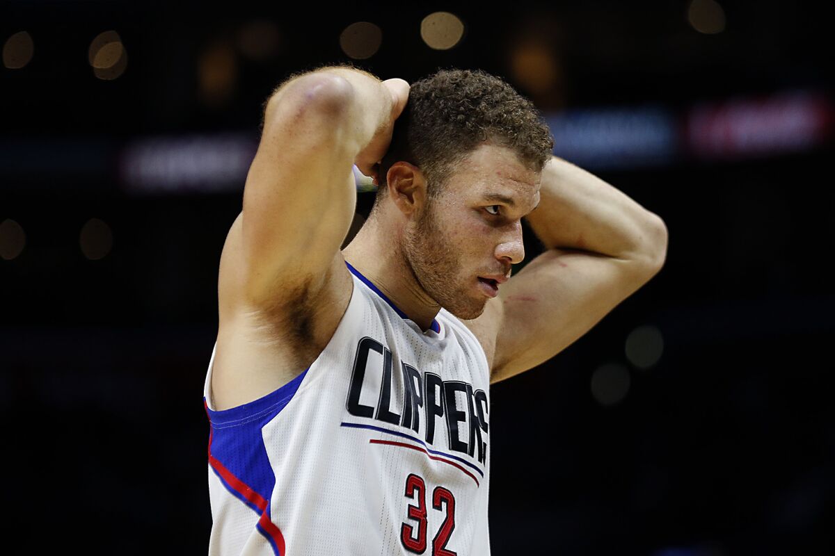 Clippers forward Blake Griffin catches his breath during a break in the action against the Indiana Pacers at Staples Center on Dec. 2, 2015.