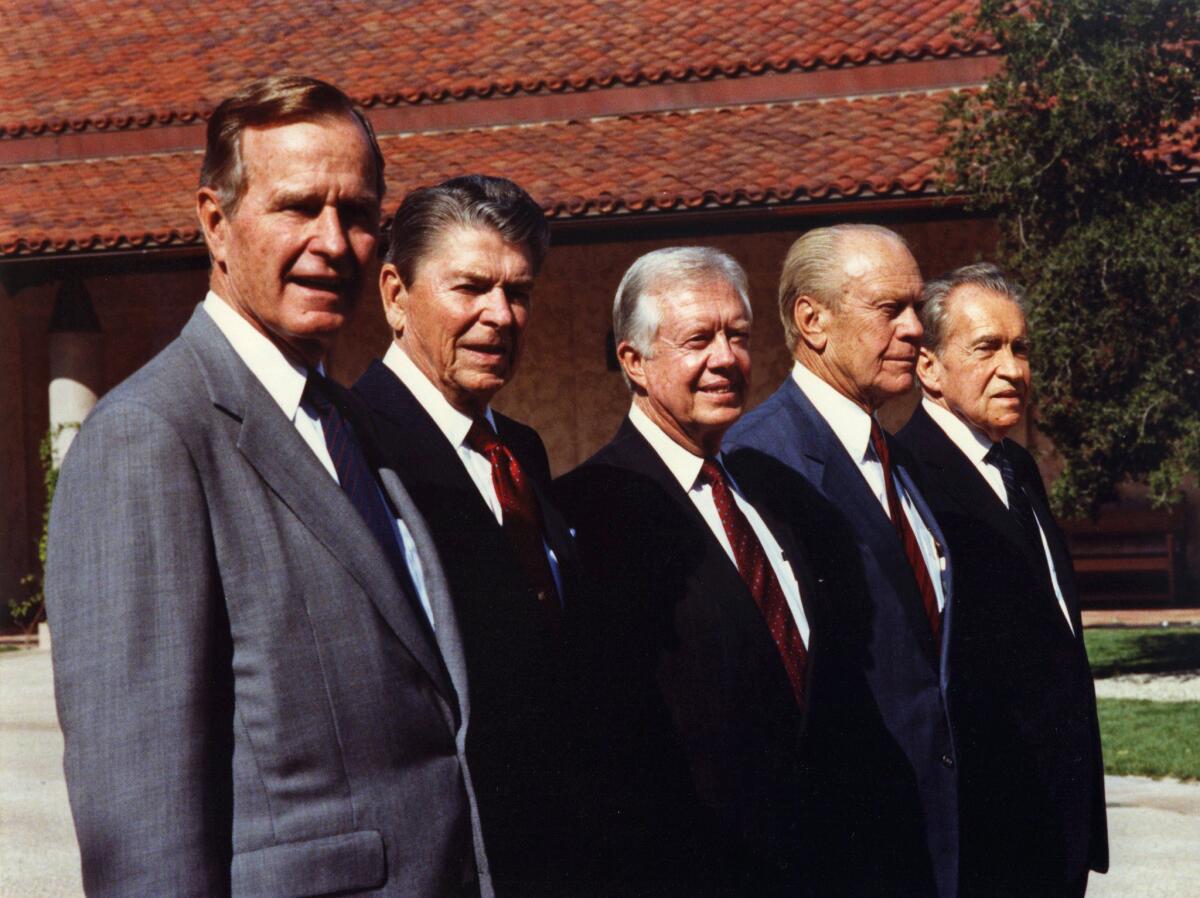 Five U.S. presidents -- George H.W. Bush, Ronald Reagan, Jimmy Carter, Gerald Ford and Richard Nixon -- pose for a portrait at the dedication of the Reagan Presidential Library in Simi Valley in 1991.