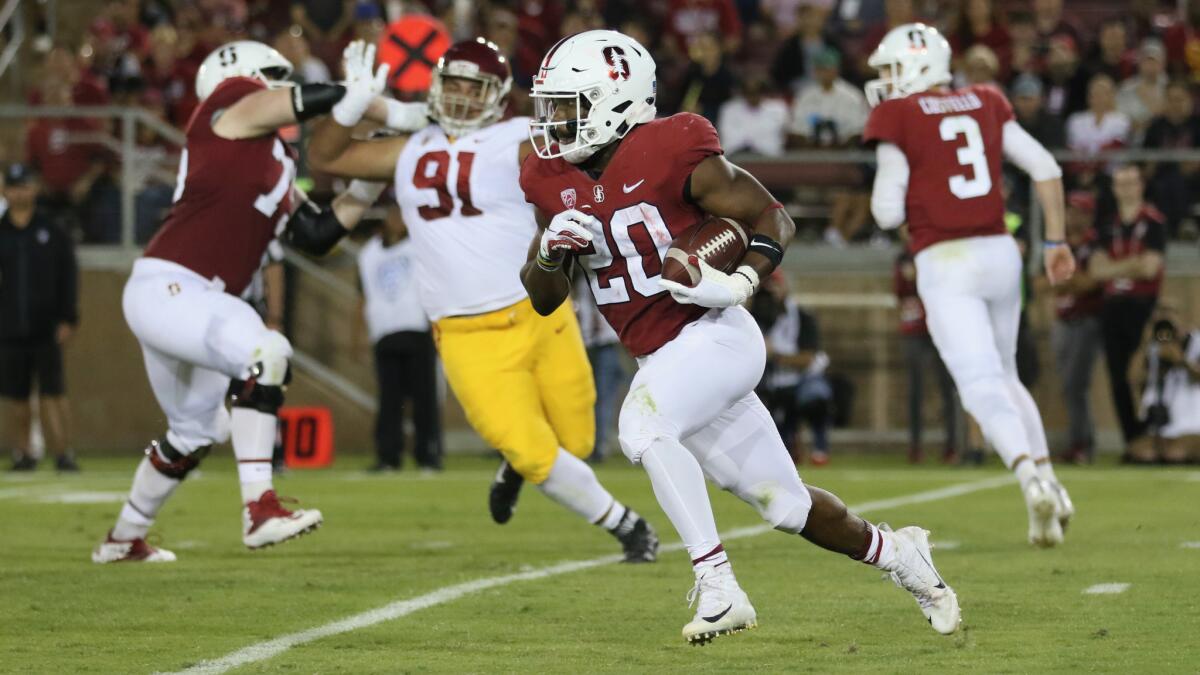 Stanford running back Bryce Love turns the corner and runs for a 59-yard gain in the third quarter against USC on Saturday.