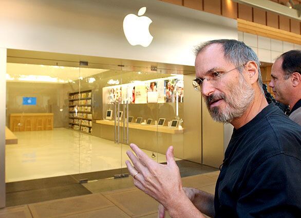 Jobs unveils the first Apple mini-store, in Palo Alto, Calif. The press conference was his first public appearance since he underwent surgery for cancer that July. Jobs, then 49, had taken a month-long leave to recuperate and quietly returned to work full time in September.