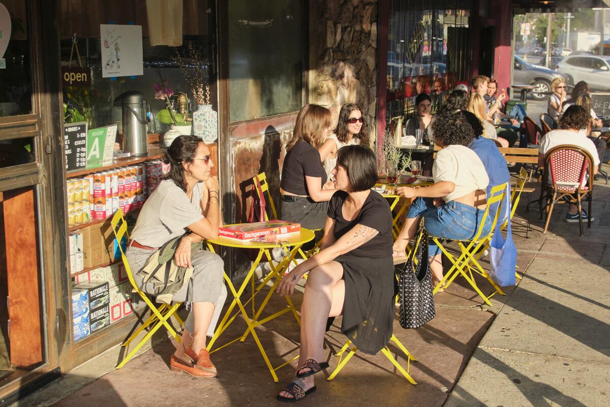 Guests gather outside Azizam, an Iranian restaurant in Silver Lake
