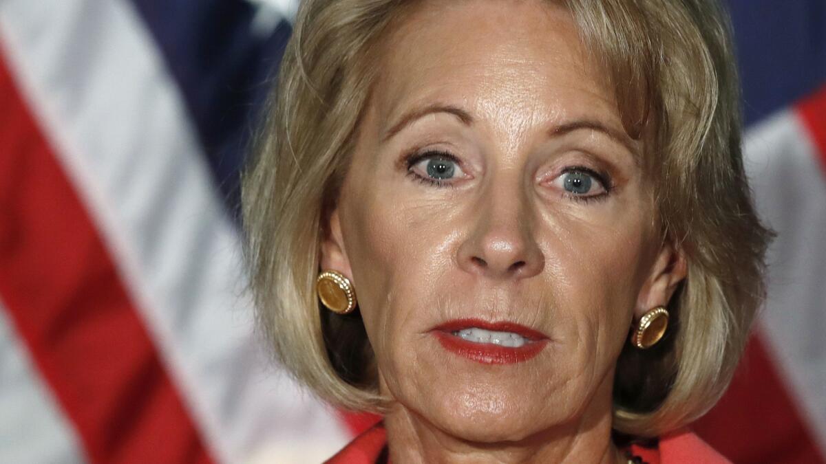 Education Secretary Betsy DeVos is proposing new rules that could make it harder for students to get their federal loans erased in cases of fraud.