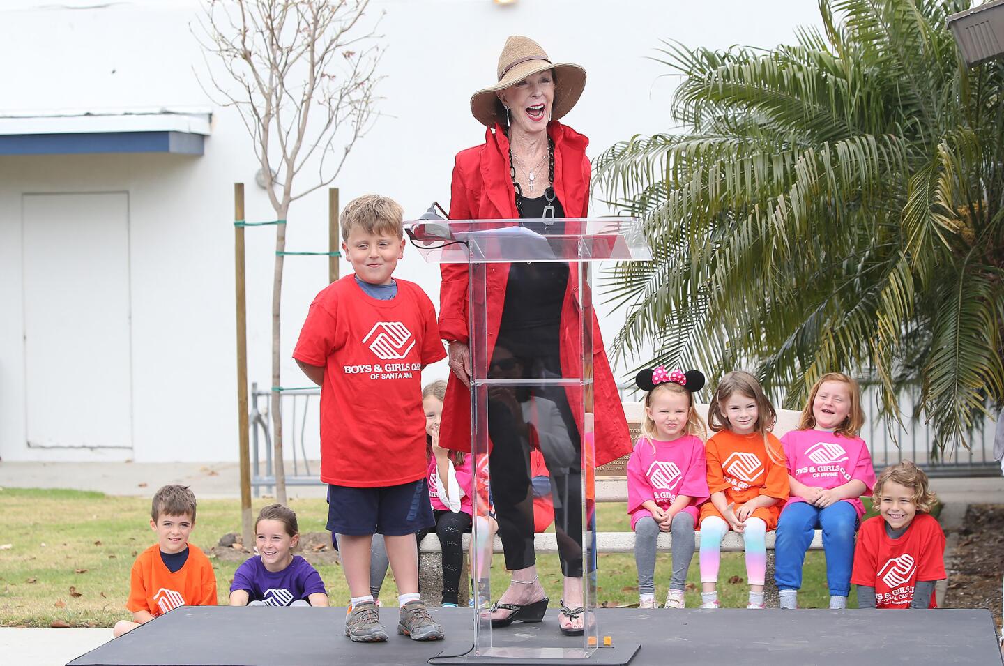 Surrounded by preschoolers, Julia Argyros announces a $1.5-million donation to the Boys & Girls Clubs of Central Orange Coast from the Argyos Family Foundation to support a renovation project at the Costa Mesa club that broke ground Tuesday.