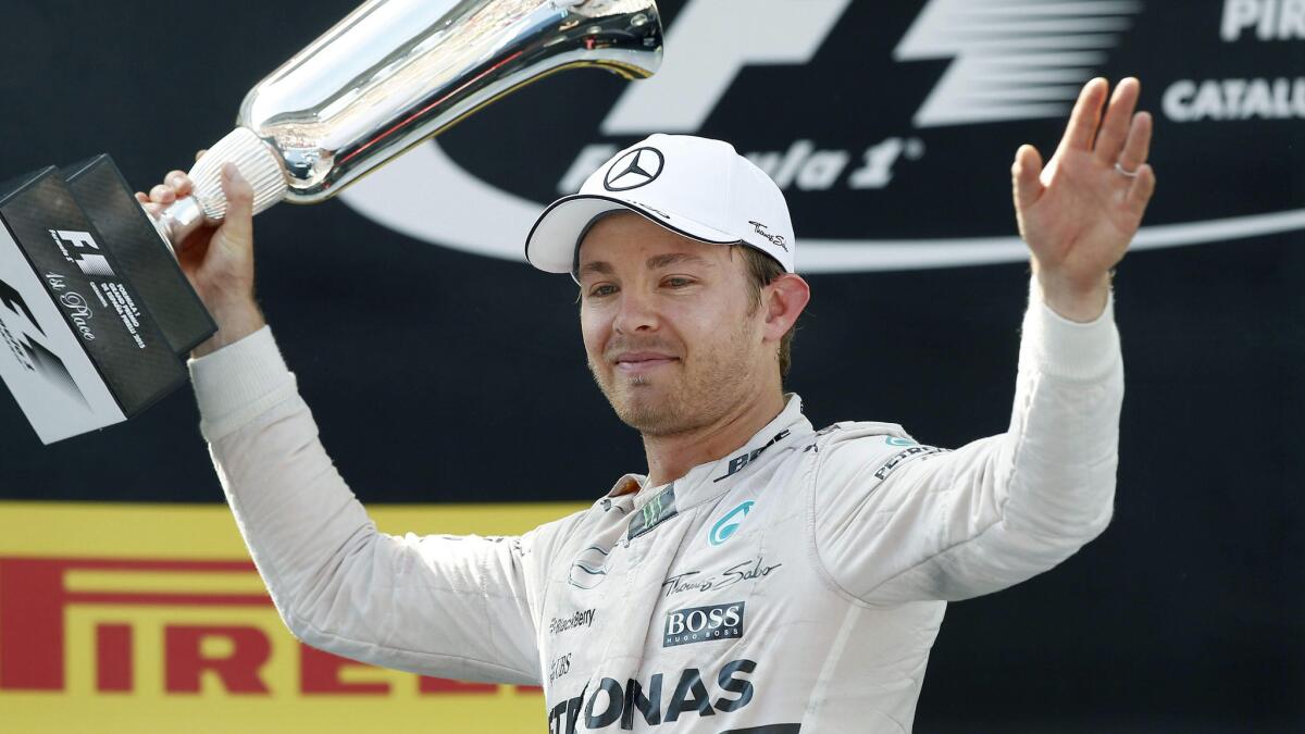 Nico Rosberg celebrates on the podium after winning the Formula One Spanish Grand Prix on Sunday.