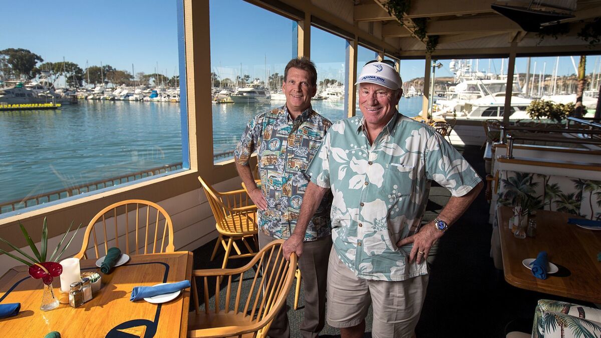 General manager Jay Styles, left, and owner Robert Mardian at the Wind and Sea restaurant in Dana Point, which is celebrating its 45th anniversary. Mardian opened the restaurant after realizing he didn't want to become a lawyer.