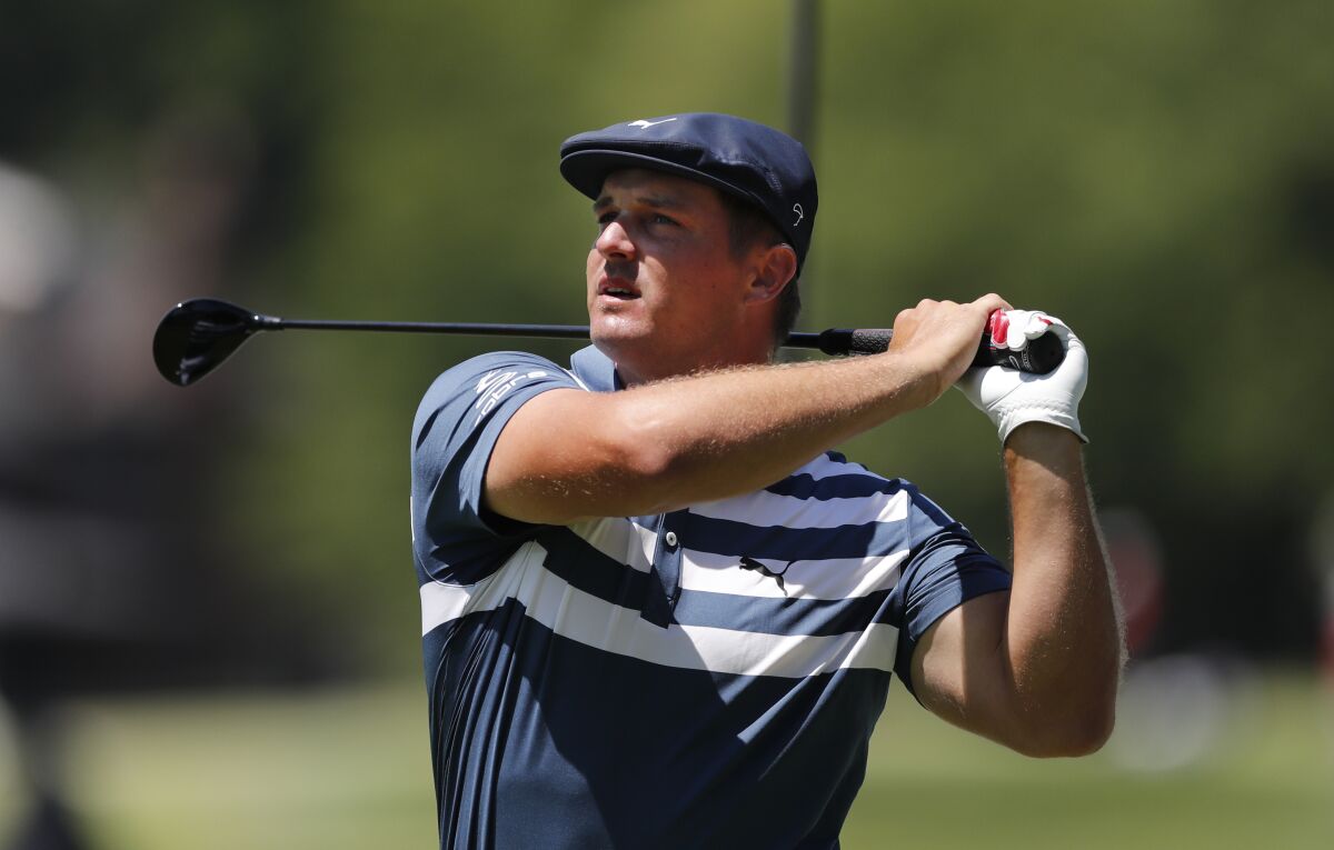Bryson DeChambeau drives on the second tee during the final round of the Rocket Mortgage Classic.