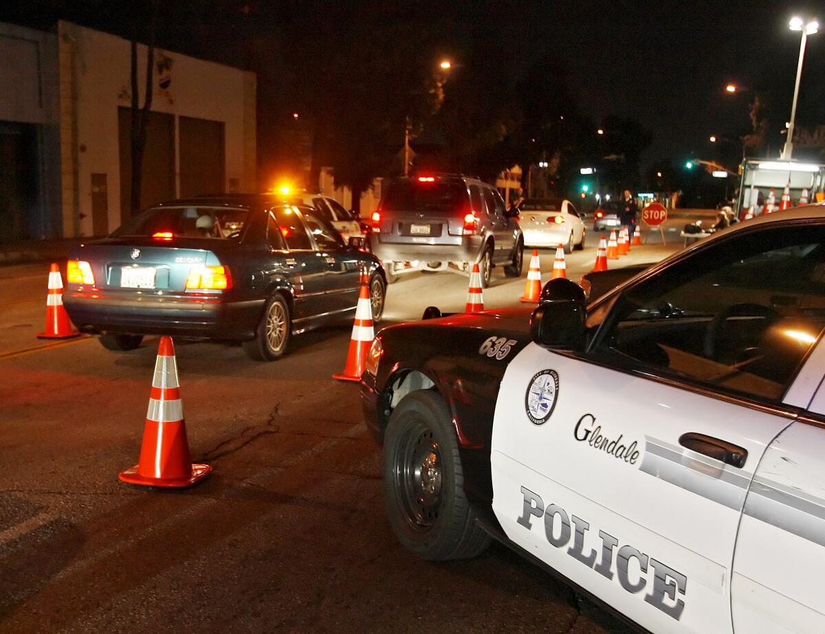 A DUI checkpoint, similar to the one in this file photo from 2010, was held by the Glendale Police Department on Jan. 31 and 12 people were arrested. Only two of the people arrested were suspected of driving under the influence, according to authorities. 