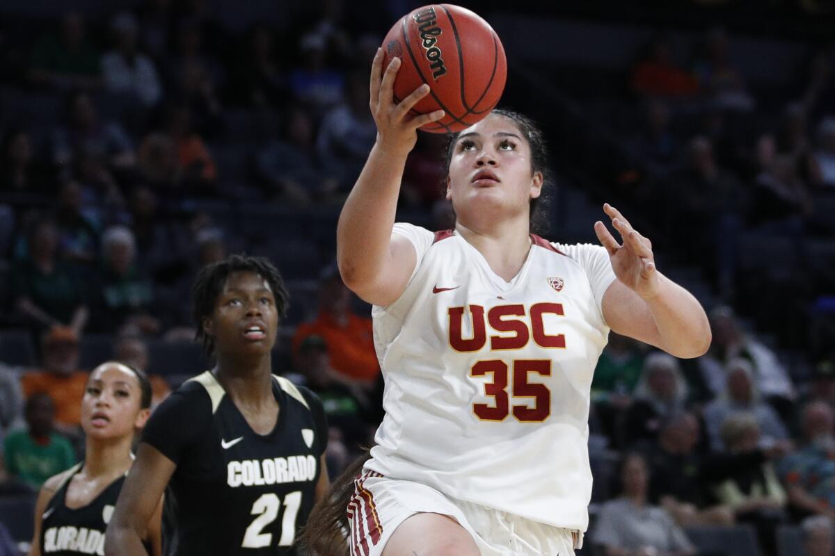 USC's Alissa Pili (35) shoots over Colorado's Mya Hollingshed (21) during the second half of the first round of the Pac-12 women's tournament on Thursday in Las Vegas.