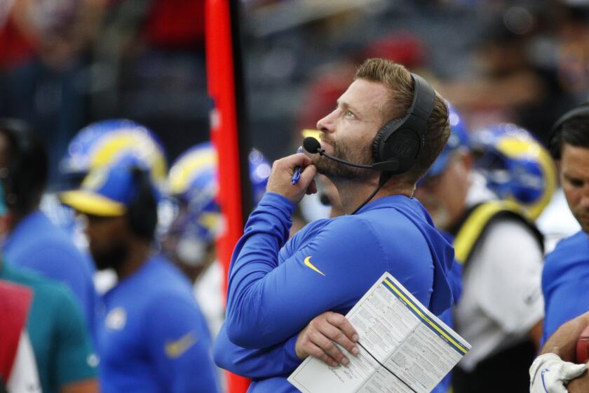 Rams head coach Sean McVay stares at the scoreboard after a failed fourth-down play against the 49ers.
