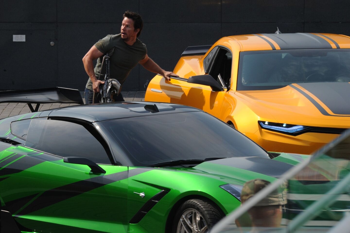 Mark Wahlberg performs on the set of "Transformers: Age of Extinction" in Hong Kong on Oct. 26, 2013.