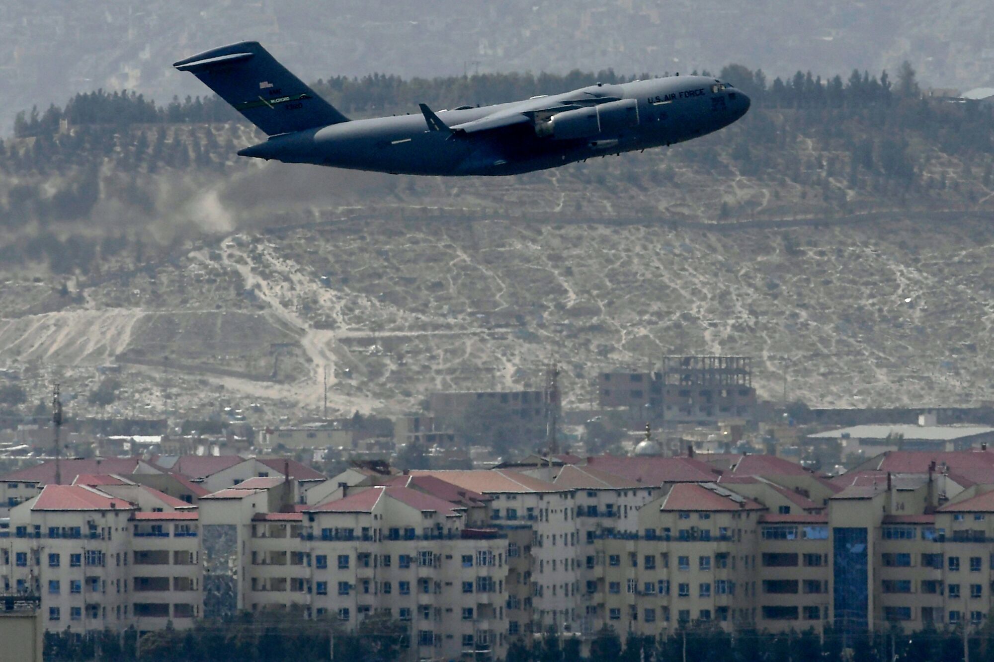 An US Air Force aircraft takes off from the airport in Kabul on August 30, 2021