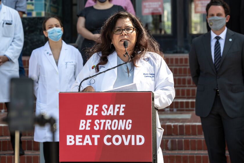 SAN DIEGO, CA - SEPTEMBER 21: Dr. Maria Carriedo-Ceniceros of Family Health Centers of San Diego speaks during a press conference with community members and medical professionals at the County Building on Monday, Sept. 21, 2020 in San Diego, CA. (Jarrod Valliere / The San Diego Union-Tribune)