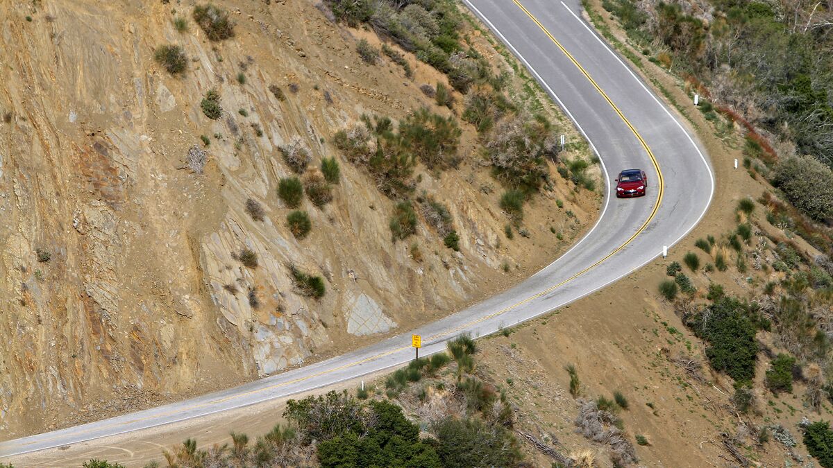A Tesla Model S on a highway