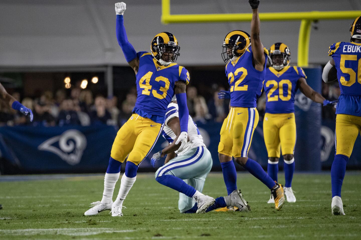 Rams strong safety John Johnson (43) and cornerback Marcus Peters (22) react after a defensive stop on the Dallas Cowboys.