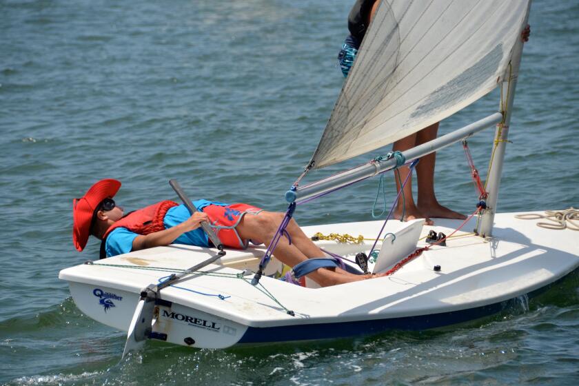 Young sailors give it their all to navigate in a Laser class competition during Flight of Newport.