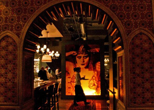 The image of silent-film actress Theda Bara as Cleopatra graces the entrance of Cleo in the Redbury Hotel in Hollywood.