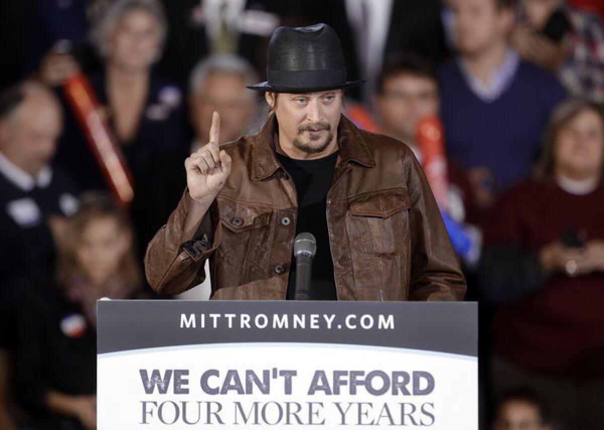 Pop music star Kid Rock speaks before introducing Republican vice presidential nominee Paul Ryan at a rally at Oakland University in Rochester, Mich.