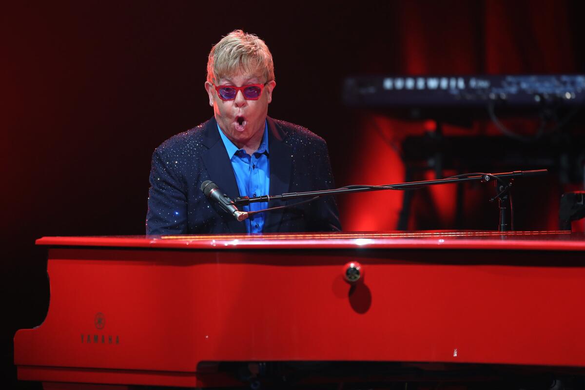 Elton John performs Wednesday night at the Wiltern in Los Angeles.