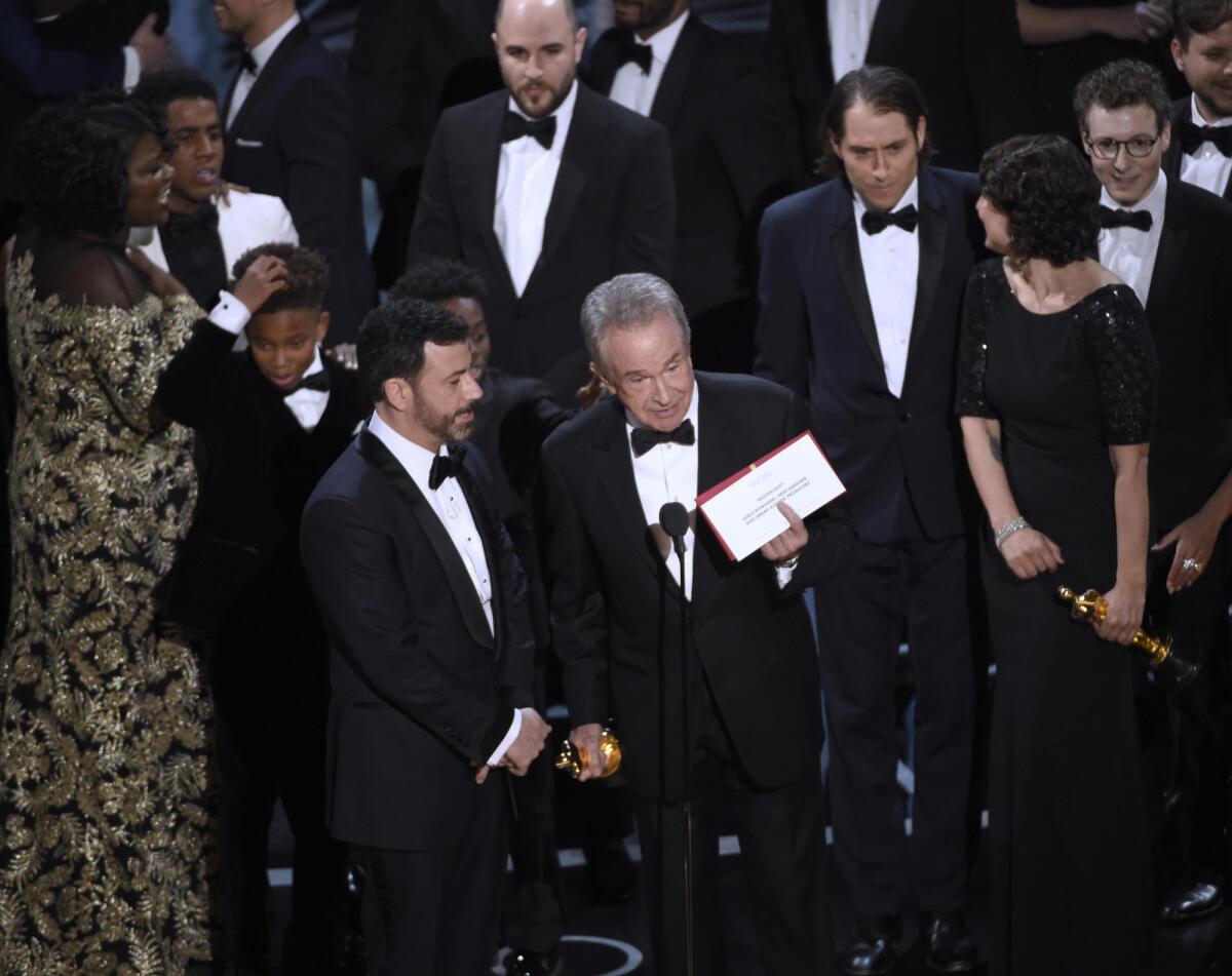Warren Beatty holds up the envelope revealing "Moonlight" as the best picture winner at the 2017 Academy Awards.