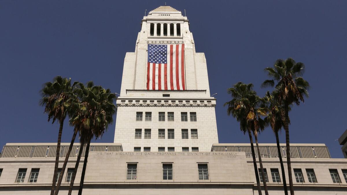 The American flag draped on Los Angeles City Hall in 2017.