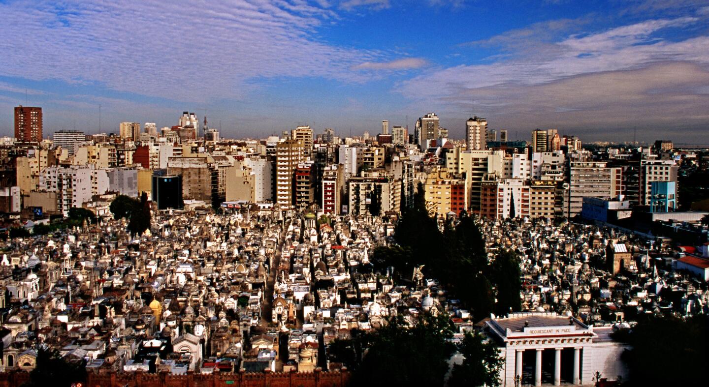 Looking over the massive Recoleta Cemetery toward Buenos Aires. Read more.