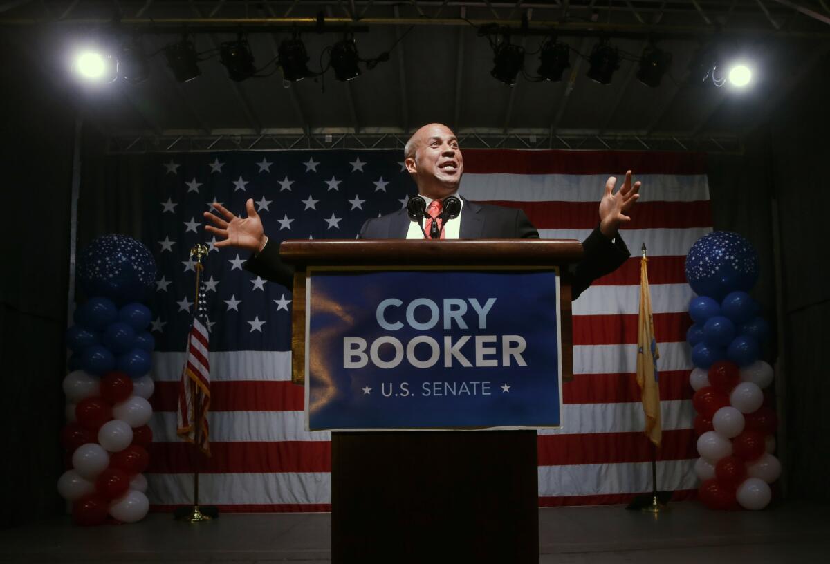 Newark, N.J., Mayor and Senate candidate Cory Booker addresses a gathering after winning the Democratic primary election in Newark.