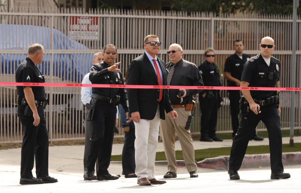 Police investigate a shooting in Sherman Oaks
