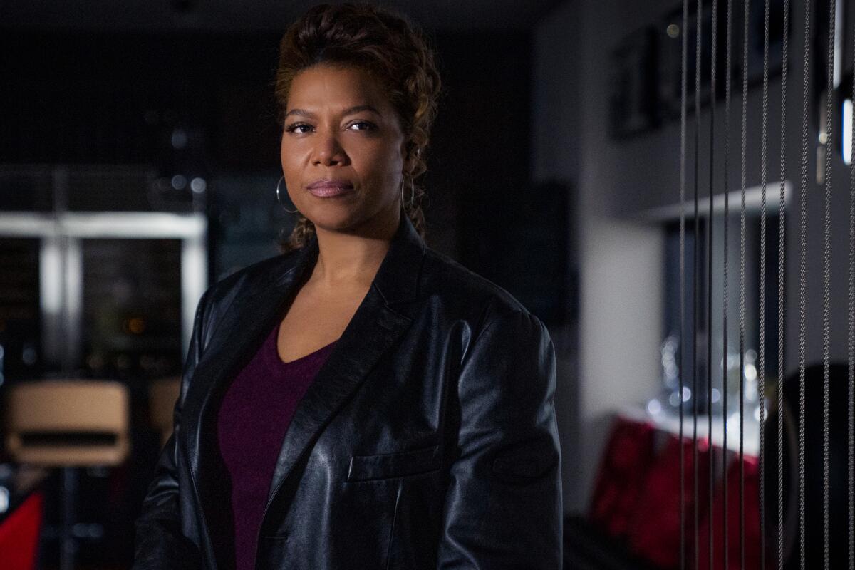 This image released by CBS shows Queen Latifah as Robyn McCall in the pilot episode of the series "The Equalizer." The series will debut immediately after CBS Sports’ Feb. 7, 2021, telecast of Super Bowl LV. (Michael Greenberg/CBS via AP)