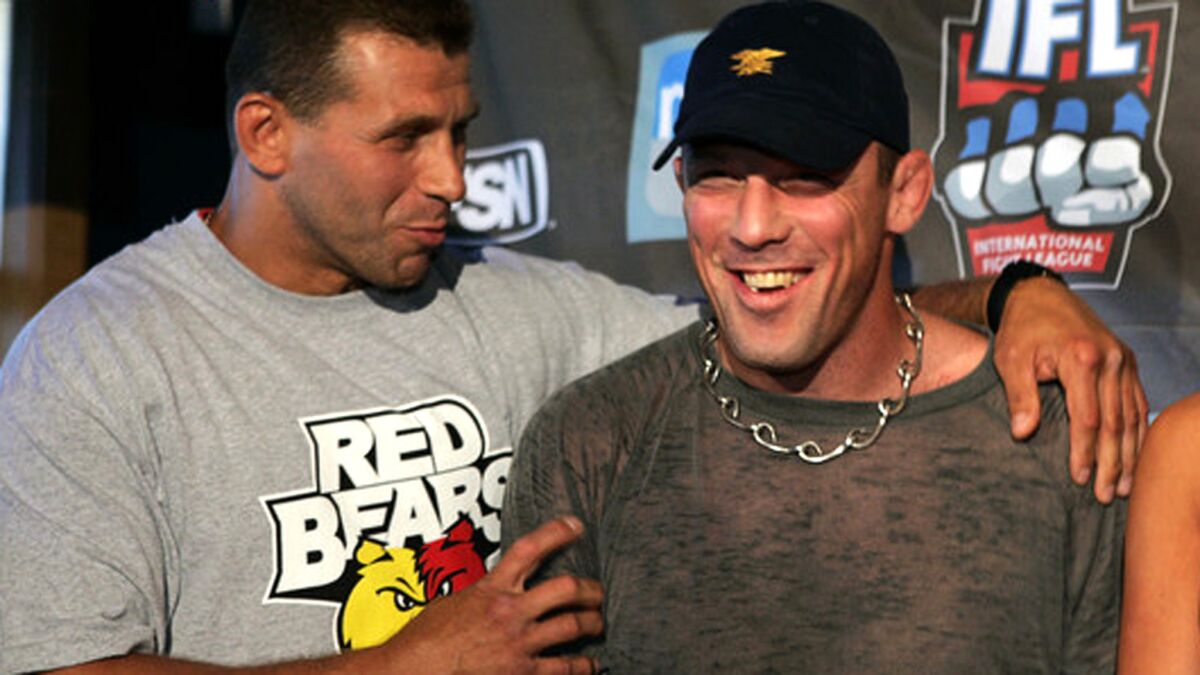 Igor Zinoviev, left, shares a light moment with Pat Miletich during a weigh-in for an Independent Fight League event on May 18, 2007.
