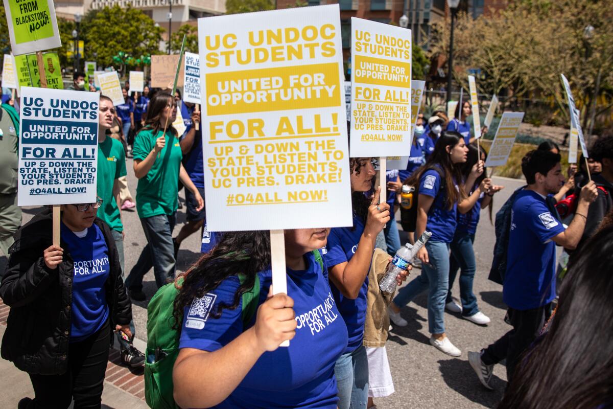 UC students and their supporters demonstrate in favor of hiring students regardless of immigration status at UCLA.