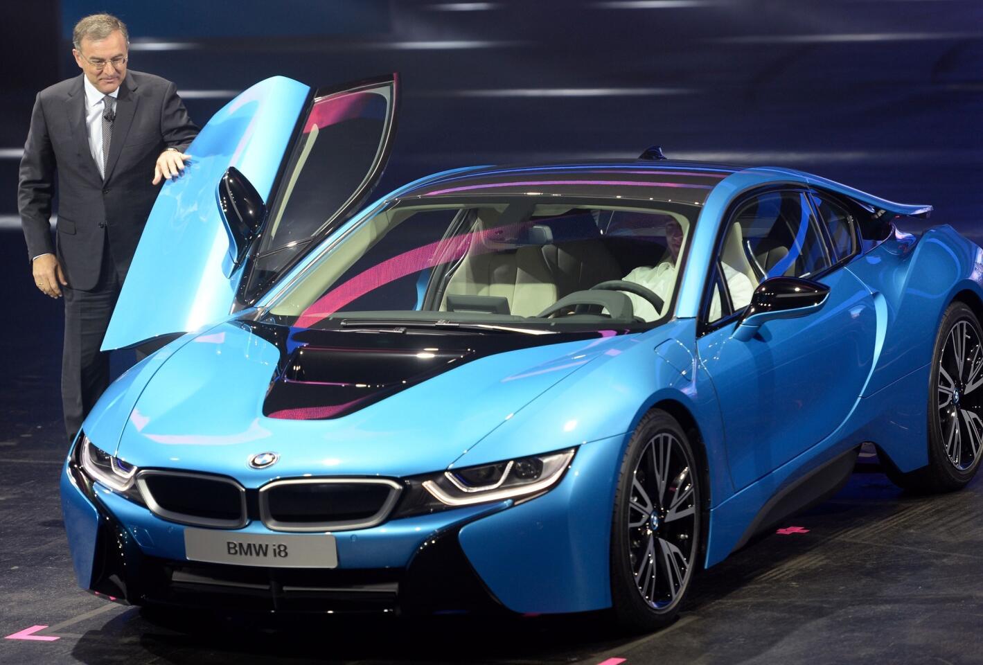 FRANKFURT AM MAIN, GERMANY - Chairman of the board of BMW Norbert Reithofer presents the new BMW i8 at the Frankfurt Auto Show.