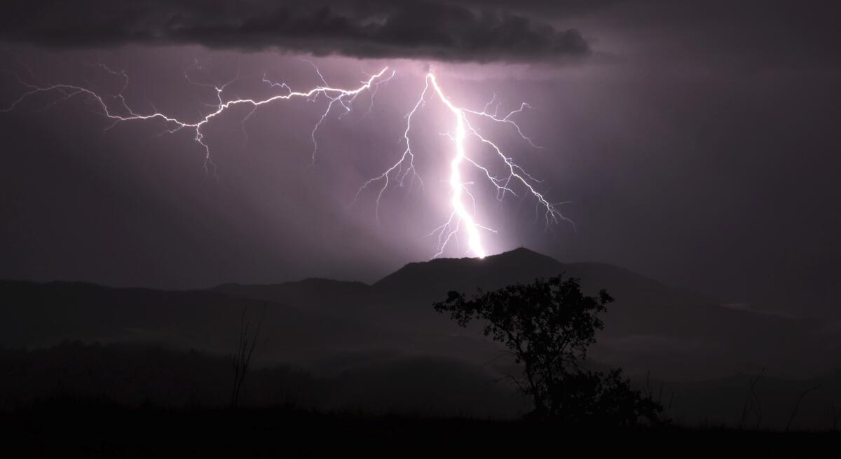 Lightning strikes over Mt. St. Helena Thursday, Sept. 9, 2021 in Napa county, Calif. Northern California was hit with well over 1,000 strikes during the storm. Fast-moving thunderstorms with lightning and little rain are moving across Northern California and raising the risk of new wildfires in the drought-stricken region. (Kent Porter/The Press Democrat via AP)