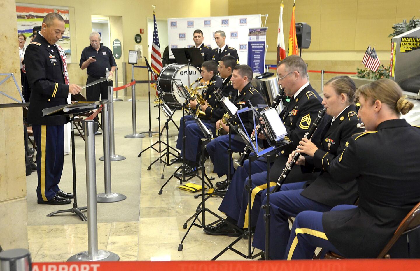 The 40th Infantry Division Band plays at the grand opening and dedication ceremony for the Bob Hope USO center at John Wayne Airport on Monday.