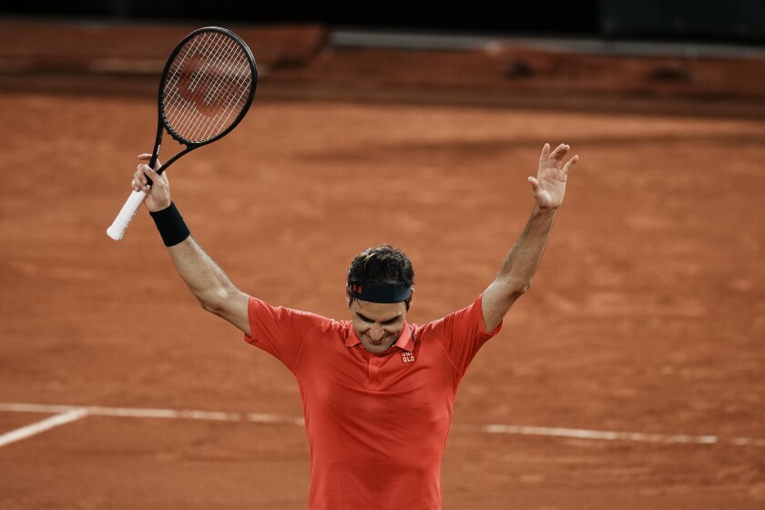 Switzerland's Roger Federer celebrates after defeating Germany's Dominik Koepfer in their third round match on day 7, of the French Open tennis tournament at Roland Garros in Paris, France, Saturday, June 5, 2021. (AP Photo/Thibault Camus)