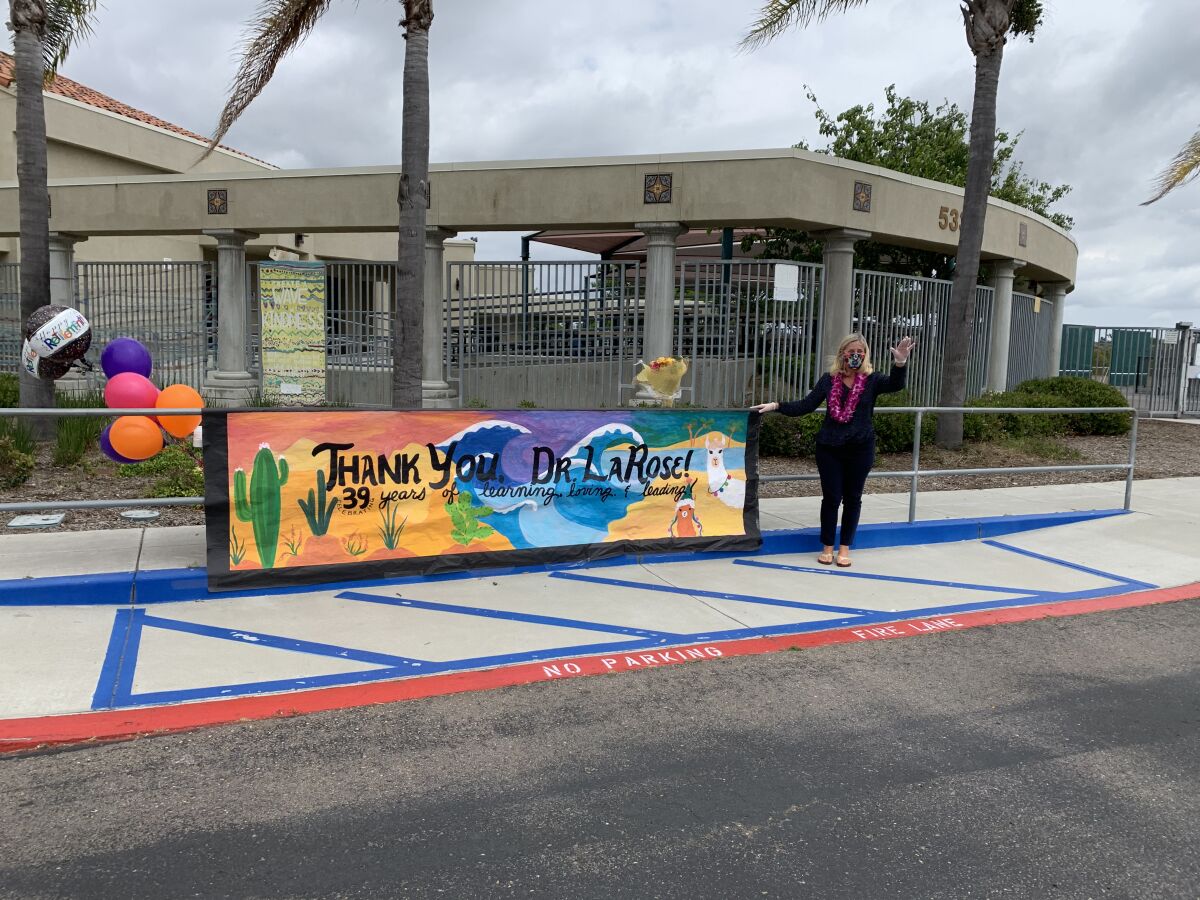The Carmel Valley community surprised Principal Peg LaRose with a surprise drive-by retirement.