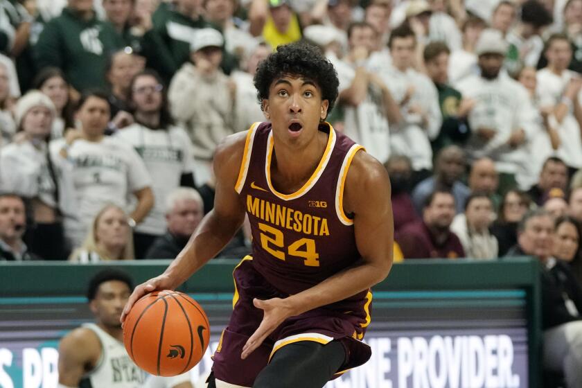 Minnesota guard Cam Christie plays against Michigan State  on Jan. 18, 