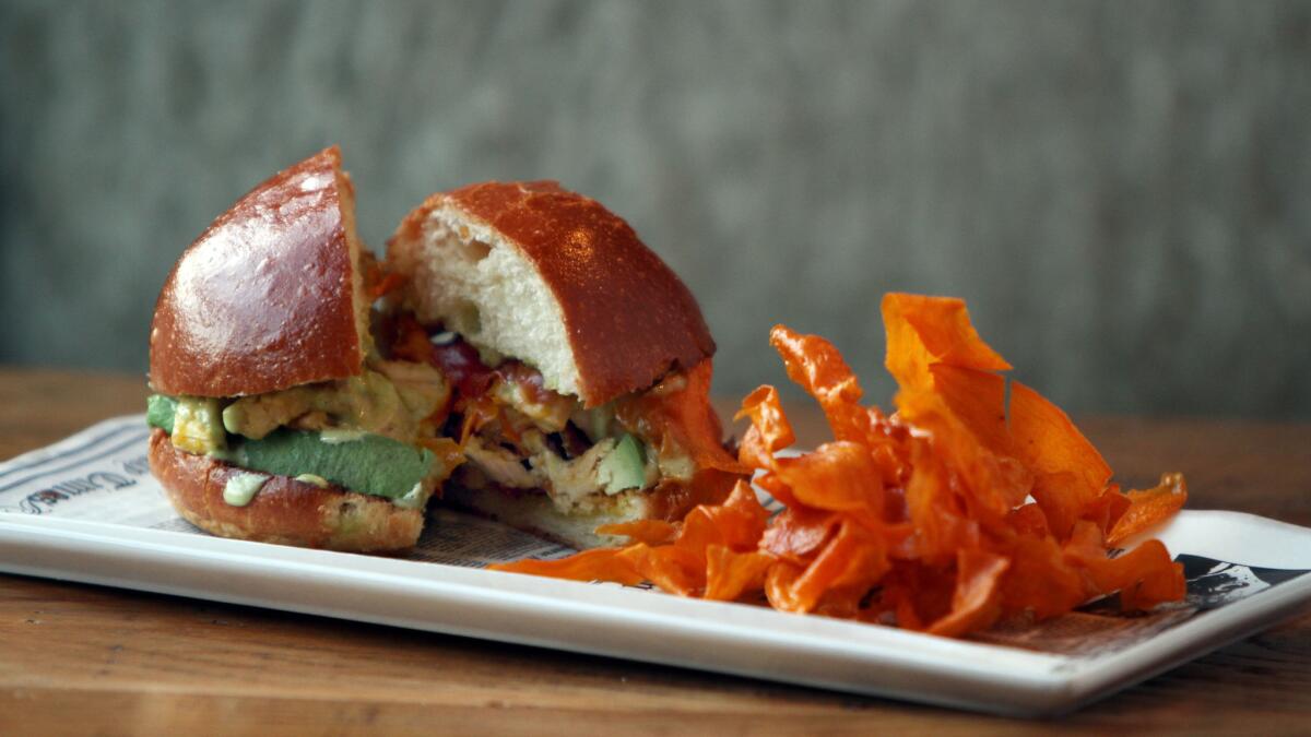 Roasted turkey with fried sweet potatoes and jalapeno-cilantro aioli.