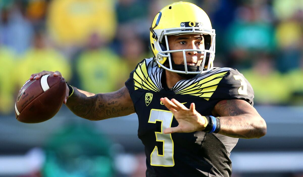 Oregon quarterback Vernon Adams Jr. looks to pass during the first half of a game against Eastern Washington on Sept. 5.