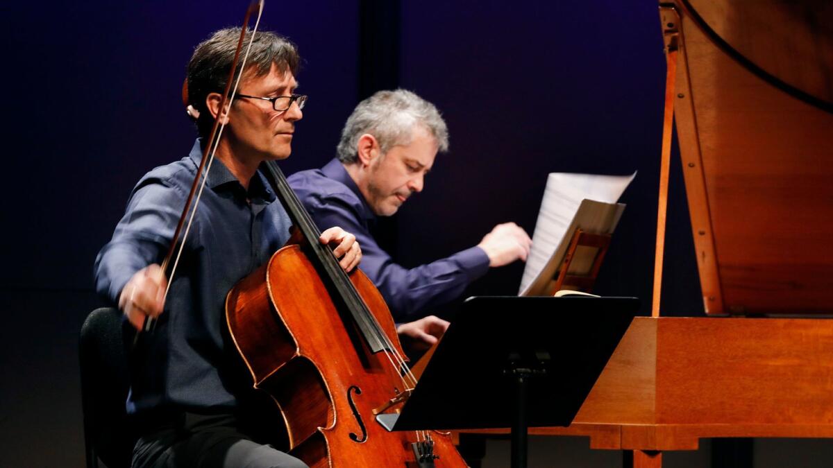 Cellist Antonio Lysy, left, and Tom Beghin playing on copy of a 1780 fortepiano.