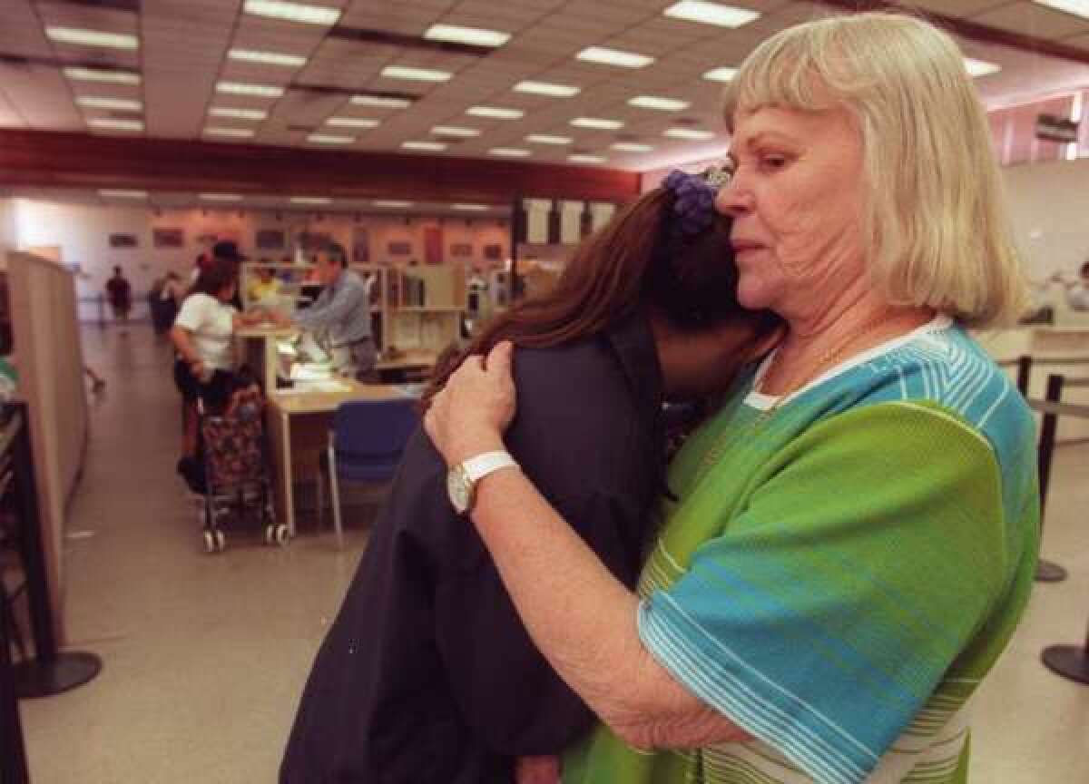 A grandmother consoles her granddaughter, who has just failed her written driver's license test. CarInsurance.com recently polled 500 U.S. drivers and found that 44% would have failed a typical written test.