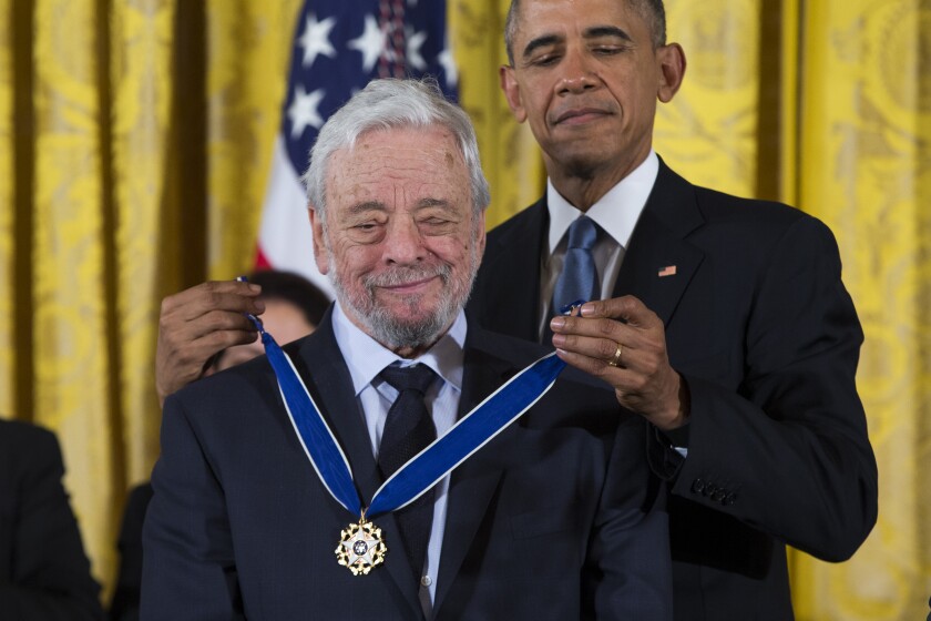 FILE - President Barack Obama, right, presents the Presidential Medal of Freedom to composer Stephen Sondheim during a ceremony in the East Room of the White House, on, Nov. 24, 2015, in Washington. Sondheim, the songwriter who reshaped the American musical theater in the second half of the 20th century, has died at age 91. Sondheim's death was announced by his Texas-based attorney, Rick Pappas, who told The New York Times the composer died Friday, Nov. 26, 2021, at his home in Roxbury, Conn. (AP Photo/Evan Vucci, File)