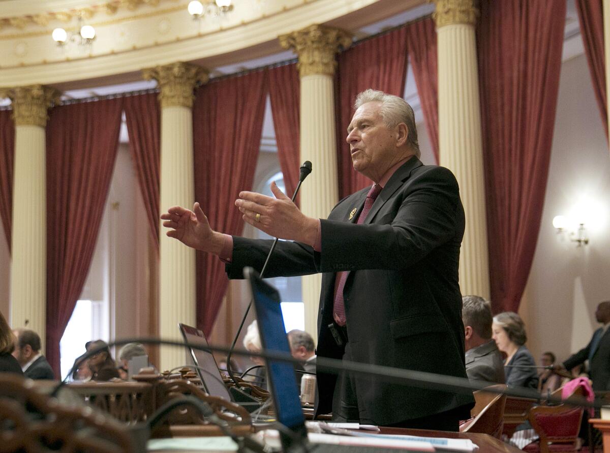 FILE - In this June 15, 2017, photo State Sen. Jim Nielsen, R-Gerber, vice chair of the Senate budget committee, calls on lawmakers to reject the 2017 state budget plan in Sacramento, Calif. Despite Republican opposition, the Senate approved the $125 billion general fund spending plan, which was negotiated by then Democratic Gov. Jerry Brown and Democratic legislative leaders. "This is a fake budget," Republican state Sen. Jim Nielsen declared on Monday, June 15, 2021 during a legislative committee hearing. "It's a feel-good budget, it's a let-us-get-paid budget. But what we are voting on is not going to be the budget." (AP Photo/Rich Pedroncelli, File)