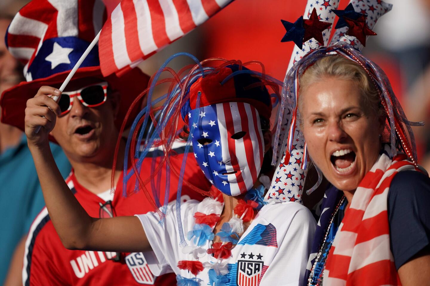 U.S. fans show their support before the start of the United States' Women's World Cup quarterfinal match against France in Paris on June 28.