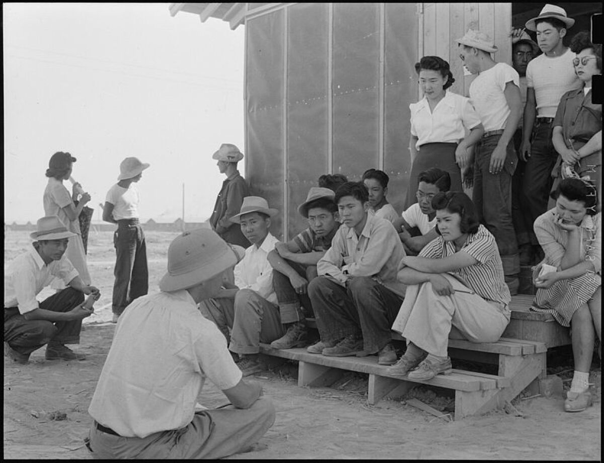 Poston internment camp detainees gather for some unknown instructional training.