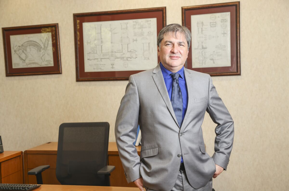 Sweetwater Authority's new general manager Carlos Quintero poses for photos in his office at the Sweetwater Authority.