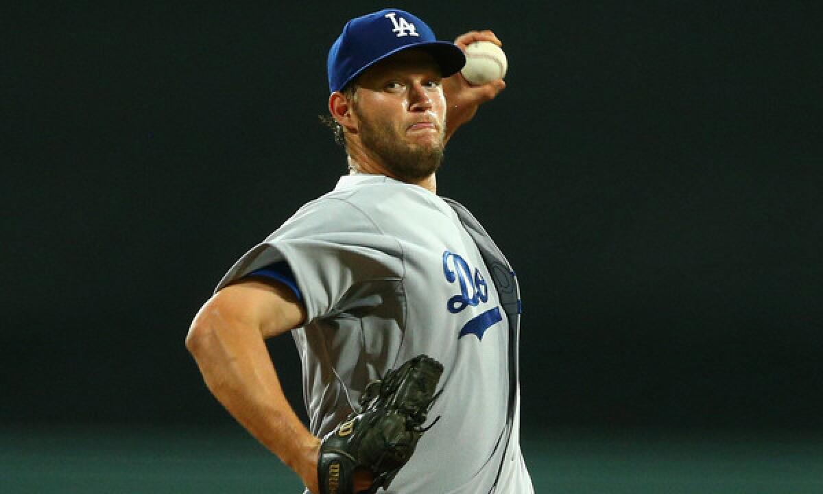 Dodgers starter Clayton Kershaw delivers a pitch during the team's season-opening win over the Arizona Diamondbacks in Australia.