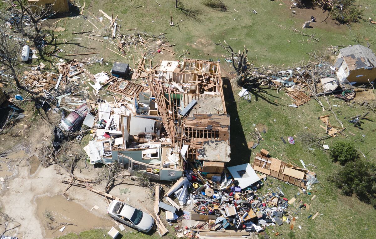 A home is destroyed from a possible tornado the next before near Andover, Kan., on Saturday, April 30, 2022 A suspected tornado that barreled through parts of Kansas has damaged multiple buildings, injured several people and left more than 6,500 people without power. (Jaime Green/The Wichita Eagle via AP)